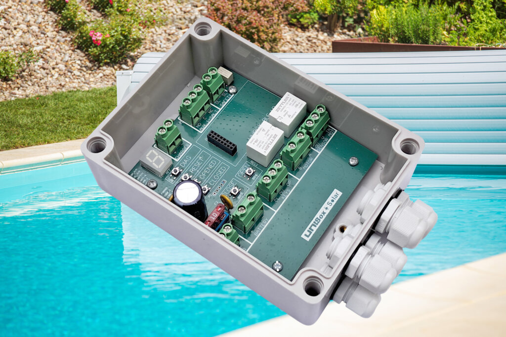 White plastic solar cover for a private outdoor pool